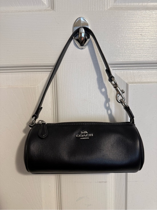 Coach Handbags - Coach Black Leather Nolita Barrel with Silver Hardware
